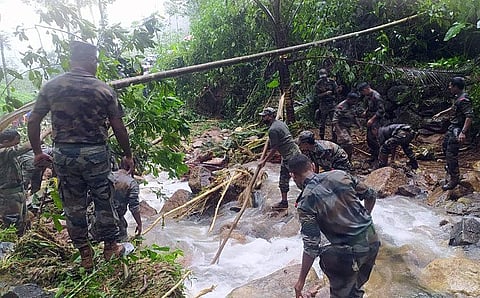 Army personnel conduct search and rescue operations at a flood-affected area, at Kavali village, in Kottayam on Sunday. (Photo | ANI)
