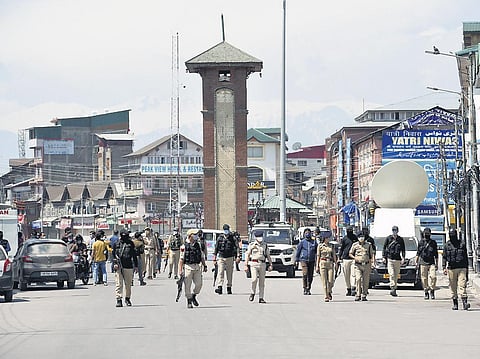 Policemen patrol Srinagar’s Lal Chowk area during the lockdown. (File photo | PTI)