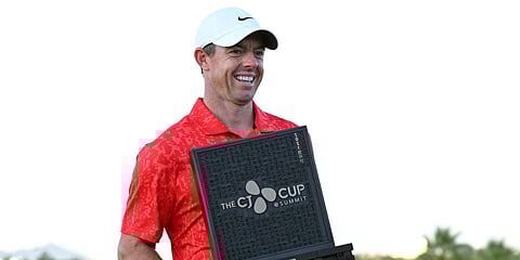 Rory McIlroy, of Northern Ireland, displays the trophy after winning the CJ Cup golf tournament. (Photo| AP)