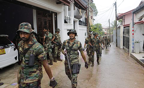 (Representational image) Sri Lankan army soldiers patrol a neighborhood during a cordon and search operation in Colombo (Photo | AP)