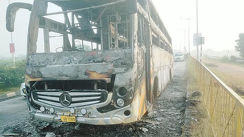 The charred remains of the bus. (Photo | Express)