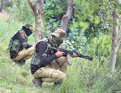 Security personnel at an encounter site in Poonch district. (Photo | PTI)