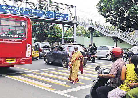 The foot over bridge near Saidapet Court is rarely used by pedestrians as they prefer the zebra crossing at Taluk Office Road at an alternative | DEDATTA MALLICK