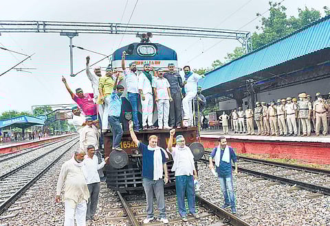 A train is stranded at a railway station in NCR’s Ghaziabad during the six-hour blockade on Monday | PTI