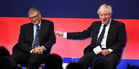 Britain's Prime Minister Boris Johnson, right, in conversation with American Businessman Bill Gates during the Global Investment Summit at the Science Museum, London, Oct, 19, 2021. (Photo | AP)