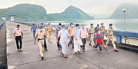 Water Resources Minister Roshy Augustine, Idukki District Collector Sheeba George and KSEB officials visiting the Idukki reservoir area on Monday | Shiyami
