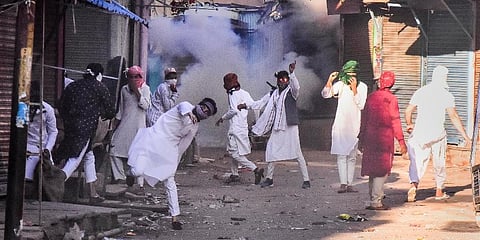 Stones being pelted at policemen during clashes following an Eid-e-Milad un Nabi procession, in Jabalpur (Photo | PTI)