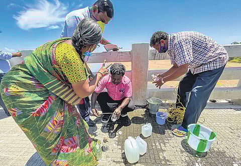 NGT officials testing water from Amaravathi River in Karur | Express
