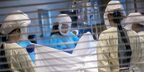 Medical professionals look after a COVID-19 patient in the ICU in Salt Lake City. (Photo | AP)