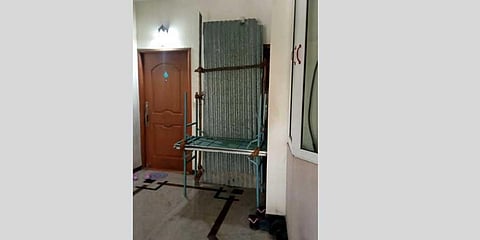 The entrance of a house in an apartment that was sealed to prevent the contacts of the positive patient from venturing out | EXPRESS