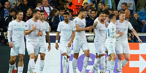 Manchester City players celebrate a goal. (Photo | AP)