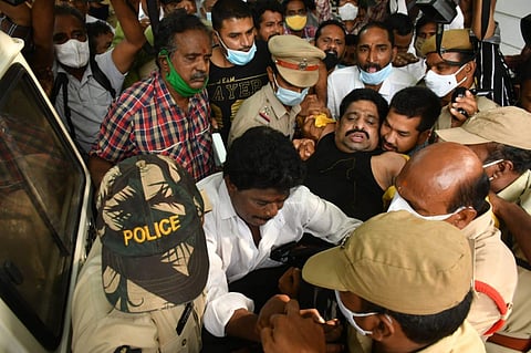 Police detains TDP leader Budda Venkanna as he reach out to stage protest in Vijayawada on Wednesday. (Photo | Prasant Madugula, EPS)