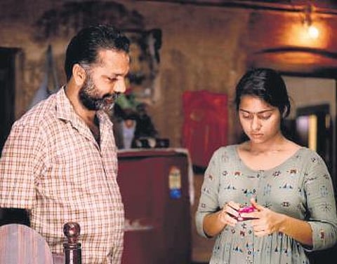 A still from 'Thinkalazhcha Nishchayam'.
