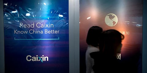 Founded by prominent editor Hu Shuli, Caixin has a think tank, a data company, investable indices, and research firms. (Photo | AP)