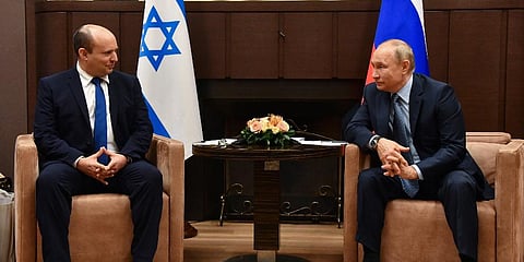 Russian President Vladimir Putin, right, and Israeli Prime Minister Naftali Bennett speak during their meeting in Sochi, Russia, Friday, Oct. 22, 2021. (Photo | AP)