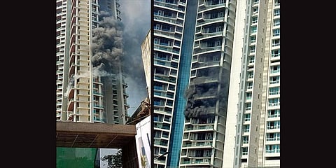 Smoke emanating from the One Avighna Park building due to a fire in the 19th floor. (Videograb)