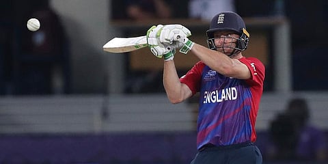England's Jos Buttler hits runs during the T20 World Cup match between England and the West Indies at the Dubai International Cricket Stadium. (Photo | AP)