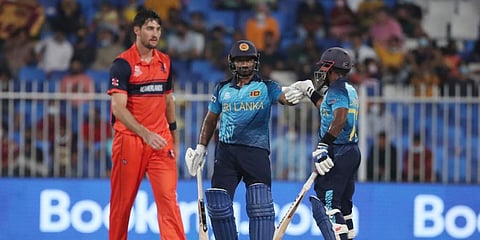 Sri Lanka's Kusal Perera (C)Â and Charith Asalanka celebrate runs between wicket during Twenty20 World Cup first round match between Sri Lanka and Netherlands in Sharjah, UAE. (Photo | AP)