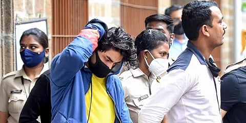 Bollywood actor Shah Rukh Khan's son Aryan Khan being taken to jail after being arrested by NCB. (File Photo | PTI)