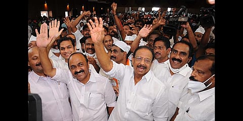 Congress president K Sudhakaran, Opposition leader V D Satheesan and other leaders wave at Congress workers ahead of a conference welcoming workers from various parties to the Congress.| A Sanesh