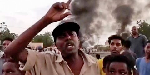 In this frame taken from video people gather during a protest in Khartoum, Sudan. (Photo | AP)