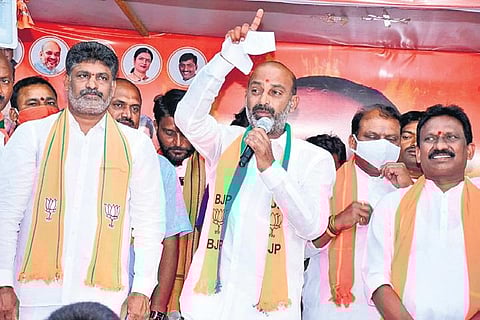 BJP State president Bandi Sanjay Kumar addresses a gathering during an election rally at Veenavanka mandal in Karimnagar district.