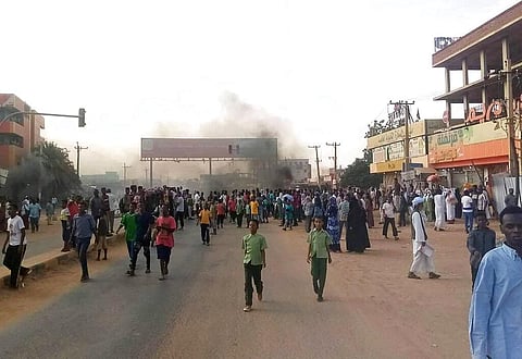 Pro-democracy protesters take to the streets to condemn a takeover by military officials in Khartoum, Sudan. (Photo | AP)