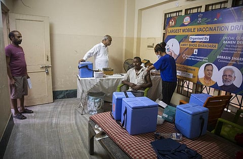 An Indian man gets inoculated against the coronavirus in Gauhati, India, Thursday, Oct. 21, 2021. (Photo | AP)