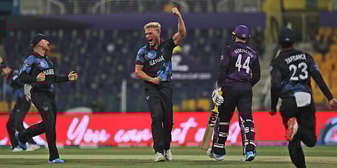 Namibia's Ruben Trumpelmann celebrates the dismissal of Scotland's Richie Berrington during a T20 World Cup match in Abu Dhabi. (Photo| ANI)