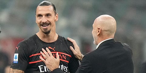AC Milan's manager Stefano Pioli, right, cheers AC Milan's Zlatan Ibrahimovic end of the Serie A soccer match against Torino, at the San Siro stadium, in Milan, Italy, Oct 26, 2021. (Photo | AP)