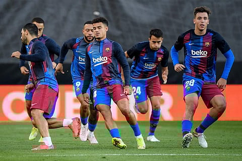 Barcelona's players warm up before a match. (Photo | AFP)