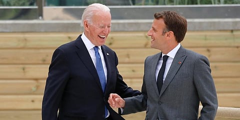 US President Joe Biden (L) speaks with French President Emmanuel Macron (File Photo | AP)
