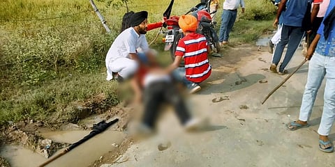 Farmers protest after two of the agitators were allegedly run over by a vehicle in the convoy of a union minister, in Lakhimpur Kheri, Sunday, Oct. 3, 2021. (Photo | PTI)