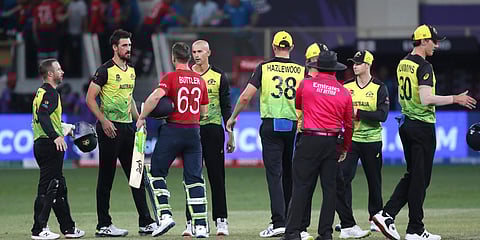 Australian players congratulate England's Jos Buttler during a T20 World Cup match in Dubai. (Photo| AP)