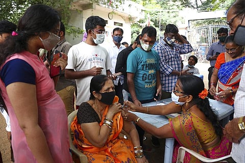 A health worker administers the Covaxin vaccine for COVID-19 in Hyderabad. (Photo | AP)