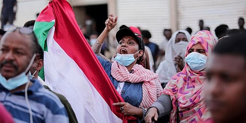 A woman chants slogans during a protest in Khartoum, Sudan, Saturday, Oct. 30, 2021. (Photo | AP)