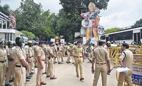 Police personnel deployed outside Kanteerava Studios where the final rites of Puneeth Rajkumar will be held. (Photo | Shriram BN, EPS)