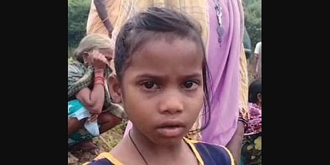 Milli Pangi with villagers on the banks of Panasput river. (Photo | EPS)