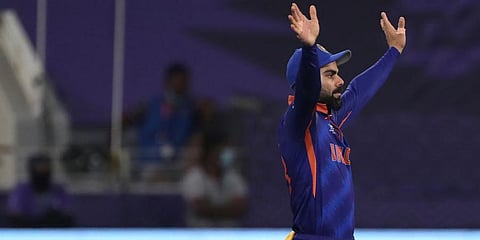 Indian captain Virat Kohli places the fielders during the Cricket Twenty20 World Cup match against New Zealand. (Photo | AP)