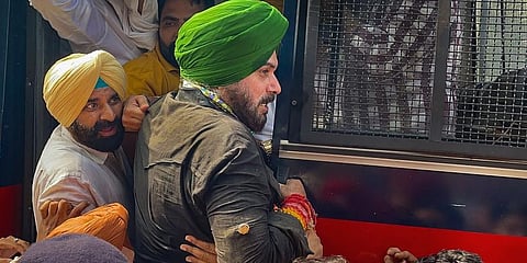 Navjot Singh Sidhu along with INC MLAs detained by Chandigarh Police while protesting in support of farmers after violenece in Lakhimpur Kheri, in Chandigarh, Monday. (Photo | PTI)
