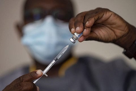 A health worker administers a dose of Janssen COVID-19 vaccine by Johnson & Johnson in the Medina neighborhood in Dakar, Senegal. (File Photo | AP)