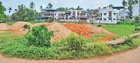 Soil dumped on the paddy field at Karippassery near HMT Junction in Kalamassery | A Sanesh