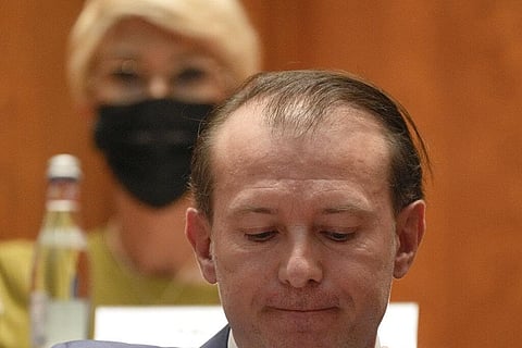 Romanian Prime Minister Florin Citu grimaces ahead of a no confidence vote in Romania's parliament in Bucharest, Romania. (Photo | AP)