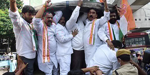 Police arrest Congress leaders who tried to burn PMr Narendra Modi's effigy near BJP office in Hyderabad. (Photo| RVK Rao, EPS)