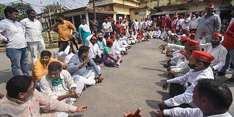 Samajwadi Party workers stage a protest over the Lakhimpur Kheri incident outside the collectorate office in Gorakhpur, Monday, Oct. 4, 2021. (Photo | PTI)
