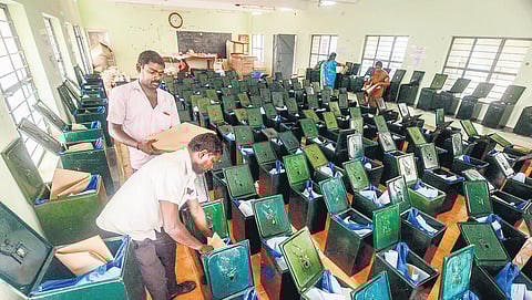 Workers preparing ballot boxes to be sent to polling booths, at Manur in Tirunelveli | V KARTHIKALAGU