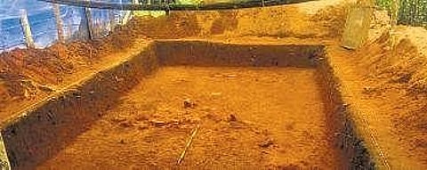 Also seen are the artefacts they unearthed.