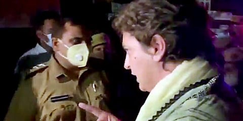 Congress General Secretary Priyanka Gandhi Vadra being detained by police on her on the way to Lakhimpur Kheri. (Photo | ANI)