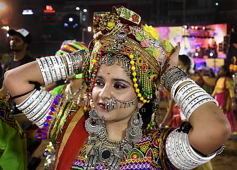 Garba is a popular folk dance of Gujarat which is performed by devotees during the festival, which will be celebrated under the shadow of the pandemic for the second straight year. (File Photo | PTI)