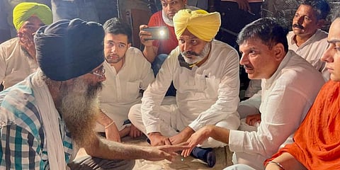AAP delegation meetign with the grieving family of the 19-year-old farmer, Lovepreet Singh, who died in the violence in Uttar Pradesh's Lakhimpur Kheri. (Photo | Twitter, Aam Aadmi Party)